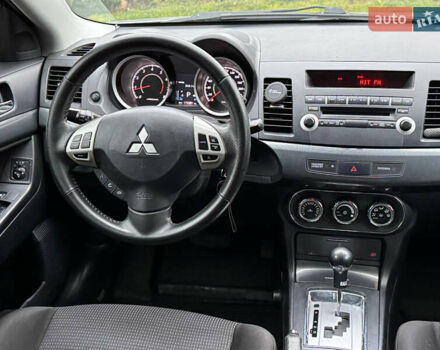 Сірий Міцубісі Lancer, об'ємом двигуна 2 л та пробігом 173 тис. км за 7200 $, фото 18 на Automoto.ua