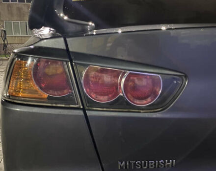 Серый Мицубиси Лансер, объемом двигателя 1.5 л и пробегом 227 тыс. км за 7300 $, фото 7 на Automoto.ua