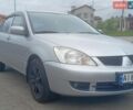 Серый Мицубиси Лансер, объемом двигателя 1.6 л и пробегом 320 тыс. км за 4800 $, фото 6 на Automoto.ua