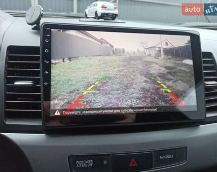 Сірий Міцубісі Lancer, об'ємом двигуна 1.5 л та пробігом 255 тис. км за 7500 $, фото 15 на Automoto.ua