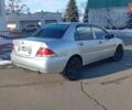 Сірий Міцубісі Lancer, об'ємом двигуна 1.6 л та пробігом 312 тис. км за 5500 $, фото 18 на Automoto.ua