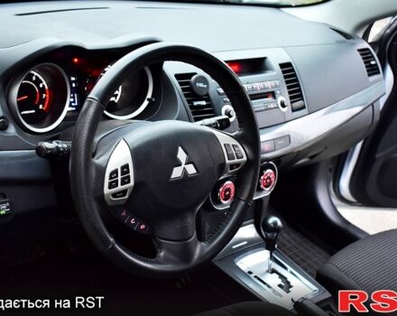 Серый Мицубиси Лансер, объемом двигателя 2 л и пробегом 178 тыс. км за 7400 $, фото 7 на Automoto.ua