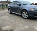 Сірий Міцубісі Lancer, об'ємом двигуна 2 л та пробігом 217 тис. км за 8300 $, фото 2 на Automoto.ua