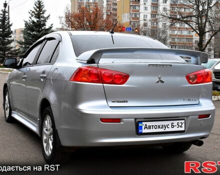 Серый Мицубиси Лансер, объемом двигателя 2 л и пробегом 178 тыс. км за 7400 $, фото 3 на Automoto.ua