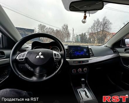 Серый Мицубиси Лансер, объемом двигателя 2.4 л и пробегом 180 тыс. км за 7300 $, фото 7 на Automoto.ua