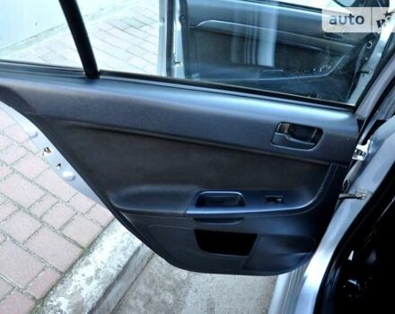 Сірий Міцубісі Lancer, об'ємом двигуна 2 л та пробігом 223 тис. км за 6900 $, фото 18 на Automoto.ua