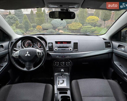 Сірий Міцубісі Lancer, об'ємом двигуна 2 л та пробігом 173 тис. км за 7200 $, фото 17 на Automoto.ua