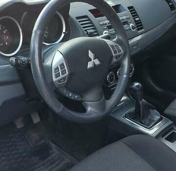 Мицубиси Лансер 2012 в Кривом Озере на Automoto.ua Серый Мицубиси Лансер, объемом двигателя 2 л и пробегом 58 тыс. км за 9500 $, фото 5 на Automoto.ua