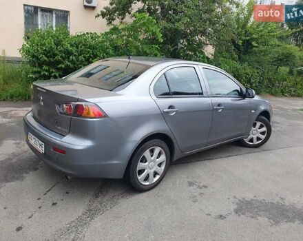 Серый Мицубиси Лансер, объемом двигателя 1.59 л и пробегом 265 тыс. км за 5950 $, фото 7 на Automoto.ua