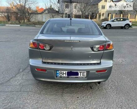 Сірий Міцубісі Lancer, об'ємом двигуна 2 л та пробігом 143 тис. км за 7750 $, фото 4 на Automoto.ua