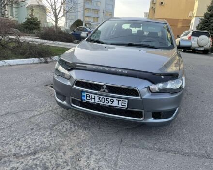 Сірий Міцубісі Lancer, об'ємом двигуна 2 л та пробігом 143 тис. км за 7750 $, фото 1 на Automoto.ua