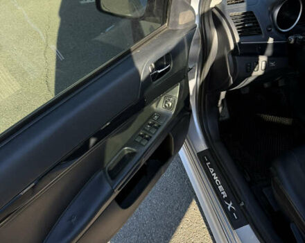 Серый Мицубиси Лансер, объемом двигателя 1.6 л и пробегом 188 тыс. км за 7400 $, фото 21 на Automoto.ua