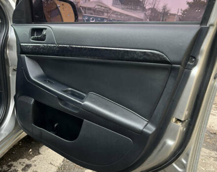 Сірий Міцубісі Lancer, об'ємом двигуна 1.59 л та пробігом 270 тис. км за 5500 $, фото 15 на Automoto.ua