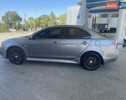 Серый Мицубиси Лансер, объемом двигателя 1.6 л и пробегом 183 тыс. км за 7400 $, фото 5 на Automoto.ua