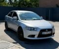 Сірий Міцубісі Lancer, об'ємом двигуна 1.59 л та пробігом 213 тис. км за 6900 $, фото 1 на Automoto.ua