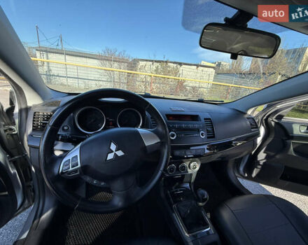 Серый Мицубиси Лансер, объемом двигателя 1.6 л и пробегом 188 тыс. км за 7400 $, фото 19 на Automoto.ua