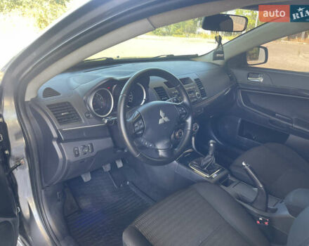 Серый Мицубиси Лансер, объемом двигателя 1.6 л и пробегом 183 тыс. км за 7400 $, фото 9 на Automoto.ua