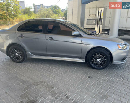 Серый Мицубиси Лансер, объемом двигателя 1.6 л и пробегом 183 тыс. км за 7400 $, фото 1 на Automoto.ua