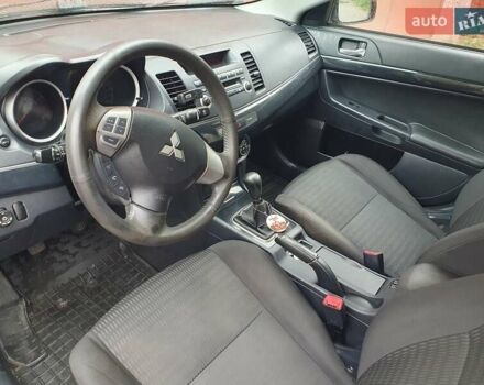 Серый Мицубиси Лансер, объемом двигателя 1.59 л и пробегом 265 тыс. км за 5950 $, фото 11 на Automoto.ua