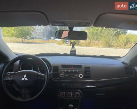 Серый Мицубиси Лансер, объемом двигателя 1.6 л и пробегом 183 тыс. км за 7400 $, фото 13 на Automoto.ua