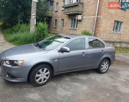 Серый Мицубиси Лансер, объемом двигателя 1.59 л и пробегом 265 тыс. км за 5950 $, фото 1 на Automoto.ua