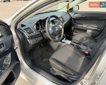 Сірий Міцубісі Lancer, об'ємом двигуна 1.6 л та пробігом 205 тис. км за 7900 $, фото 8 на Automoto.ua