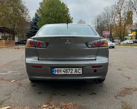 Серый Мицубиси Лансер, объемом двигателя 2 л и пробегом 170 тыс. км за 7400 $, фото 4 на Automoto.ua