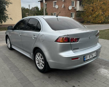 Сірий Міцубісі Lancer, об'ємом двигуна 1.6 л та пробігом 86 тис. км за 7400 $, фото 6 на Automoto.ua