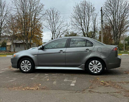 Серый Мицубиси Лансер, объемом двигателя 2 л и пробегом 170 тыс. км за 7400 $, фото 2 на Automoto.ua