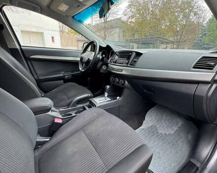 Серый Мицубиси Лансер, объемом двигателя 2 л и пробегом 170 тыс. км за 7400 $, фото 15 на Automoto.ua