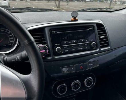 Сірий Міцубісі Lancer, об'ємом двигуна 1.6 л та пробігом 32 тис. км за 8500 $, фото 11 на Automoto.ua