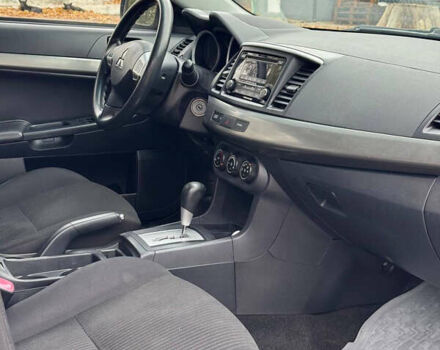 Серый Мицубиси Лансер, объемом двигателя 2 л и пробегом 170 тыс. км за 7400 $, фото 26 на Automoto.ua