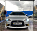 Сірий Міцубісі Lancer, об'ємом двигуна 1.6 л та пробігом 240 тис. км за 7000 $, фото 1 на Automoto.ua