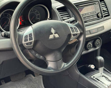 Серый Мицубиси Лансер, объемом двигателя 2 л и пробегом 170 тыс. км за 7400 $, фото 22 на Automoto.ua