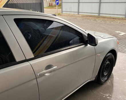 Сірий Міцубісі Lancer, об'ємом двигуна 1.6 л та пробігом 240 тис. км за 7000 $, фото 4 на Automoto.ua