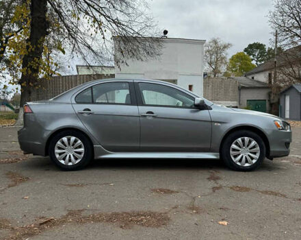 Серый Мицубиси Лансер, объемом двигателя 2 л и пробегом 170 тыс. км за 7400 $, фото 6 на Automoto.ua