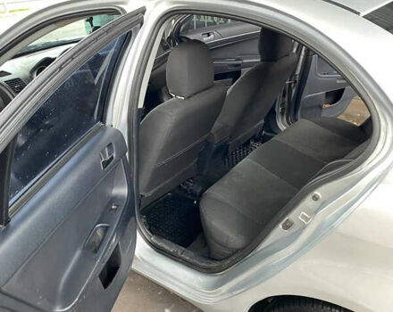 Сірий Міцубісі Lancer, об'ємом двигуна 1.6 л та пробігом 240 тис. км за 7000 $, фото 9 на Automoto.ua