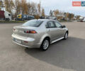 Сірий Міцубісі Lancer, об'ємом двигуна 1.6 л та пробігом 205 тис. км за 7900 $, фото 4 на Automoto.ua