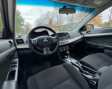 Серый Мицубиси Лансер, объемом двигателя 2 л и пробегом 170 тыс. км за 7400 $, фото 17 на Automoto.ua