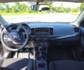 Серый Мицубиси Лансер, объемом двигателя 1.59 л и пробегом 128 тыс. км за 9000 $, фото 1 на Automoto.ua