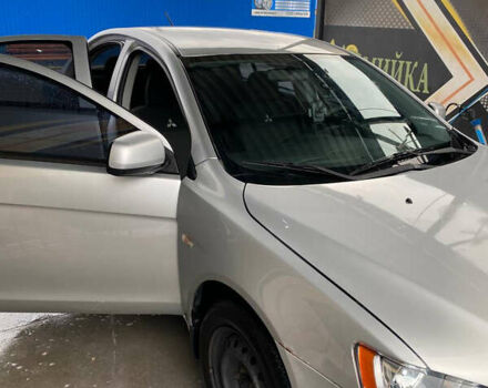 Сірий Міцубісі Lancer, об'ємом двигуна 1.6 л та пробігом 240 тис. км за 7000 $, фото 12 на Automoto.ua