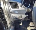 Серый Мицубиси Лансер, объемом двигателя 1.59 л и пробегом 128 тыс. км за 9000 $, фото 12 на Automoto.ua