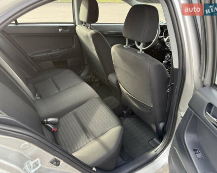Сірий Міцубісі Lancer, об'ємом двигуна 1.6 л та пробігом 205 тис. км за 7900 $, фото 12 на Automoto.ua