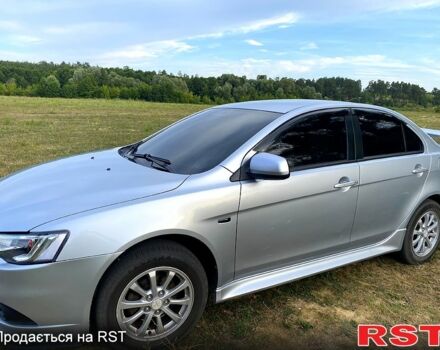 Серый Мицубиси Лансер, объемом двигателя 1.6 л и пробегом 170 тыс. км за 8300 $, фото 2 на Automoto.ua