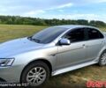 Серый Мицубиси Лансер, объемом двигателя 1.6 л и пробегом 170 тыс. км за 8300 $, фото 2 на Automoto.ua