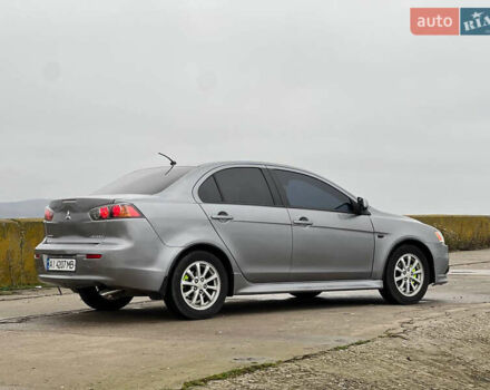 Серый Мицубиси Лансер, объемом двигателя 1.59 л и пробегом 200 тыс. км за 6900 $, фото 4 на Automoto.ua