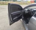 Серый Мицубиси Лансер, объемом двигателя 2 л и пробегом 190 тыс. км за 7500 $, фото 6 на Automoto.ua