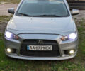 Сірий Міцубісі Lancer, об'ємом двигуна 1.6 л та пробігом 160 тис. км за 9700 $, фото 1 на Automoto.ua