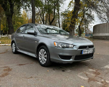 Серый Мицубиси Лансер, объемом двигателя 2 л и пробегом 170 тыс. км за 7400 $, фото 7 на Automoto.ua