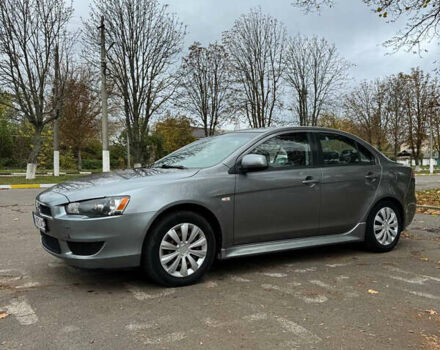 Серый Мицубиси Лансер, объемом двигателя 2 л и пробегом 170 тыс. км за 7400 $, фото 1 на Automoto.ua